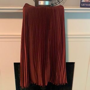 Red pleated skirt